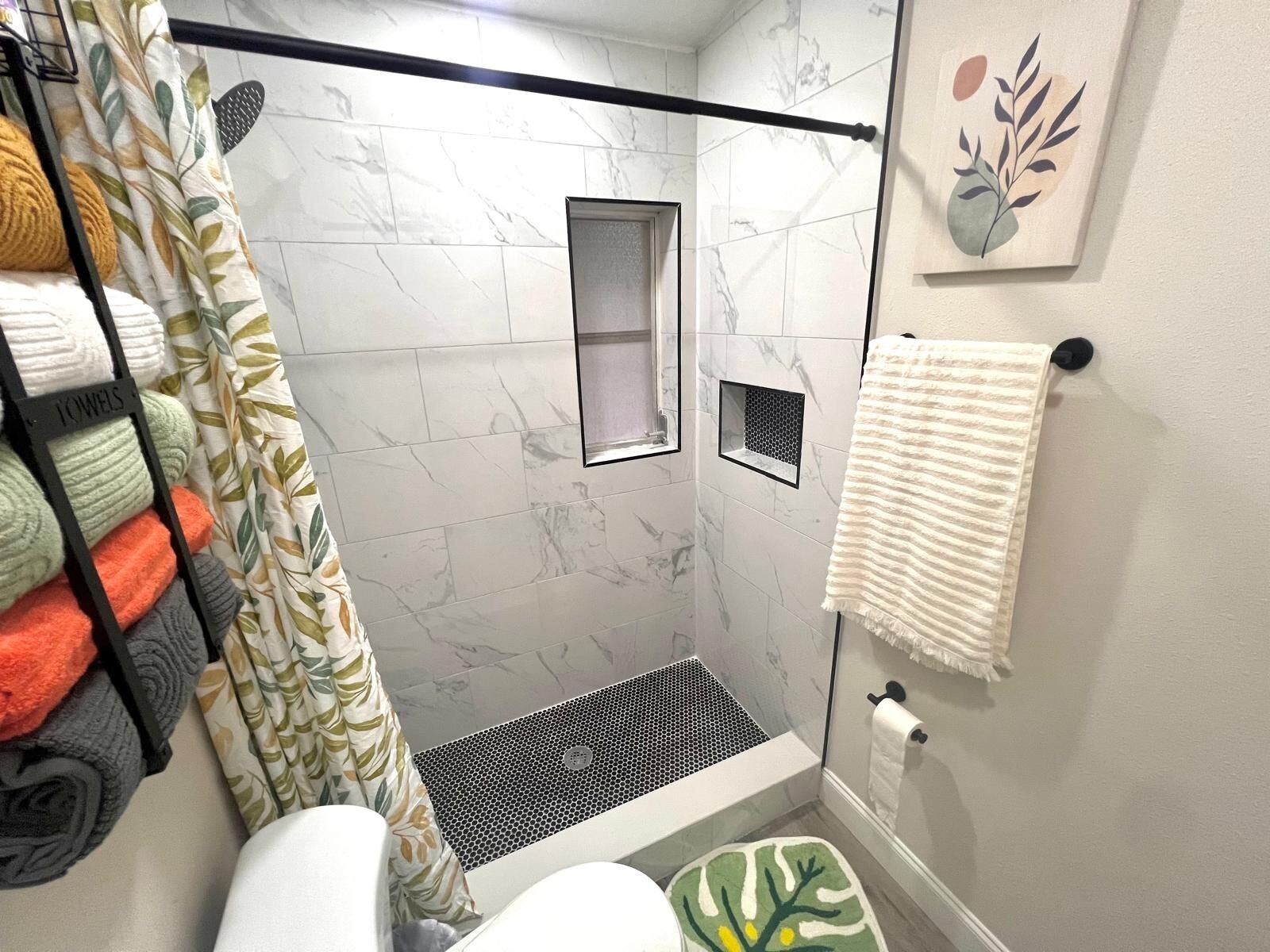 Shower, hair dryer, towels, soap