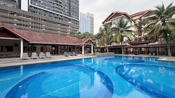 Outdoor pool, open 7:00 AM to 10:00 PM, pool umbrellas, pool loungers