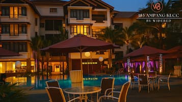 Outdoor pool, open 7:00 AM to 10:00 PM, pool umbrellas, pool loungers