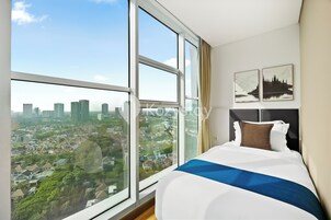 Apartment, 2 Bedrooms, City View | Desk, laptop workspace, iron/ironing board, free WiFi