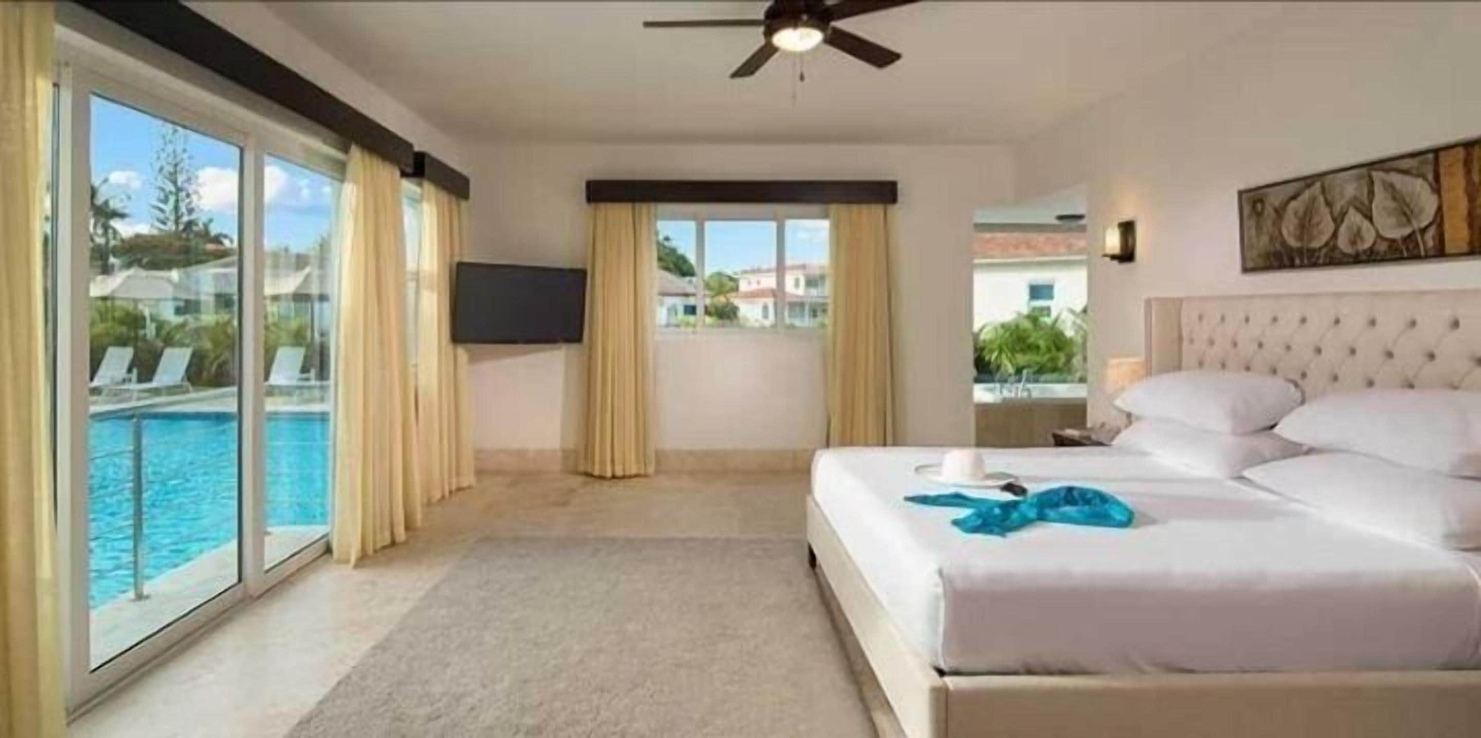 Villa, uitzicht op tuin | Een kluis op de kamer, individueel gemeubileerd