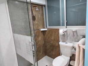 Shower, hair dryer, towels, soap