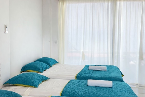 Family Quadruple Room, Multiple Beds, Balcony, Sea View | Blackout drapes, free WiFi, bed sheets