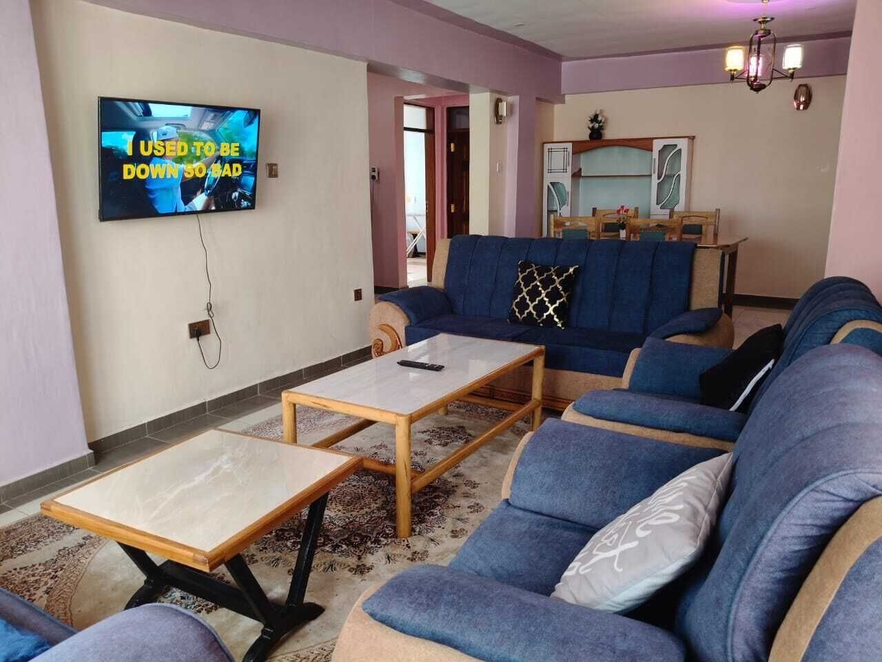 Deluxe Apartment, City View | Living area | 32-inch Smart TV with digital channels