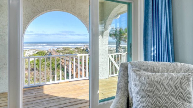 A balcony with a view of the beach and ocean. - Oceanfront Home! Spectacular Sunrise and Sunset Views, Private Boardwalk to Beach, Two Balconies! (St. Augustine)