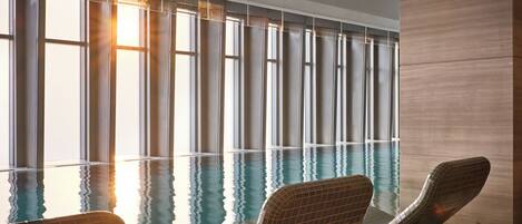 Indoor pool, open 7:00 AM to 10:00 PM, lifeguards on site