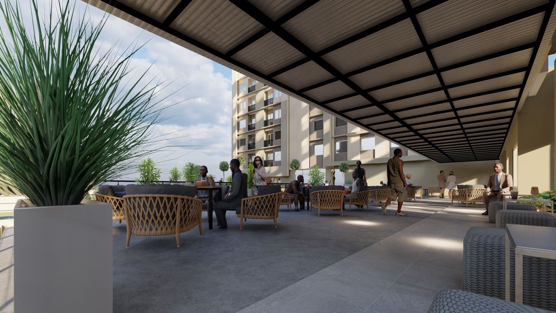 An outdoor seating area with wicker furniture and a covered section.