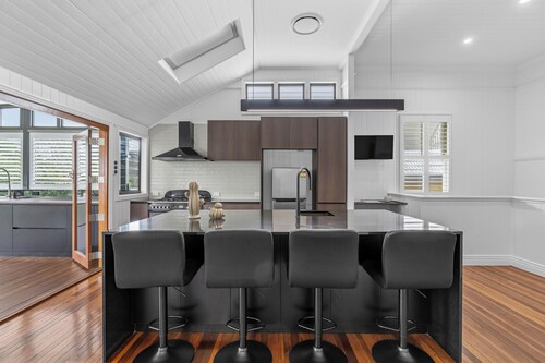 Elegant Dual-Level Home Near Cafés, Parks & River