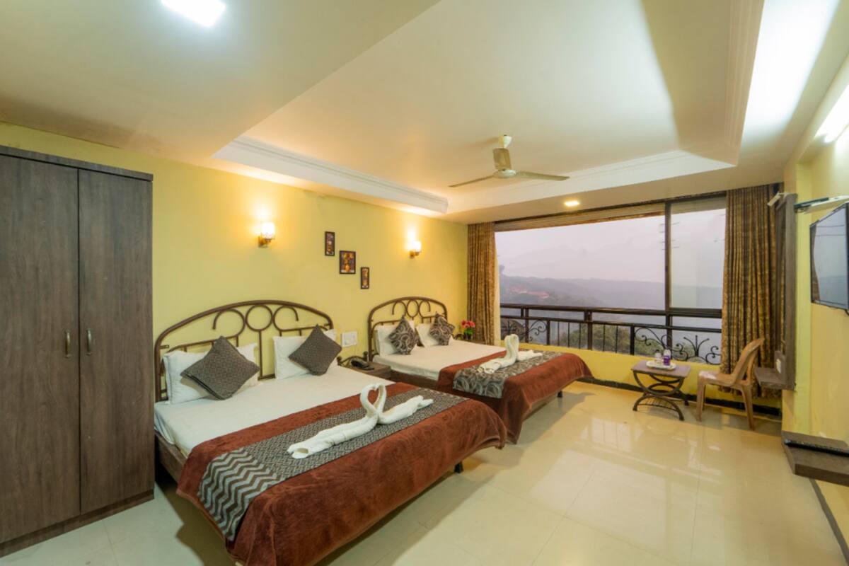 Habitación familiar | Escritorio, sistema de insonorización, wifi gratis