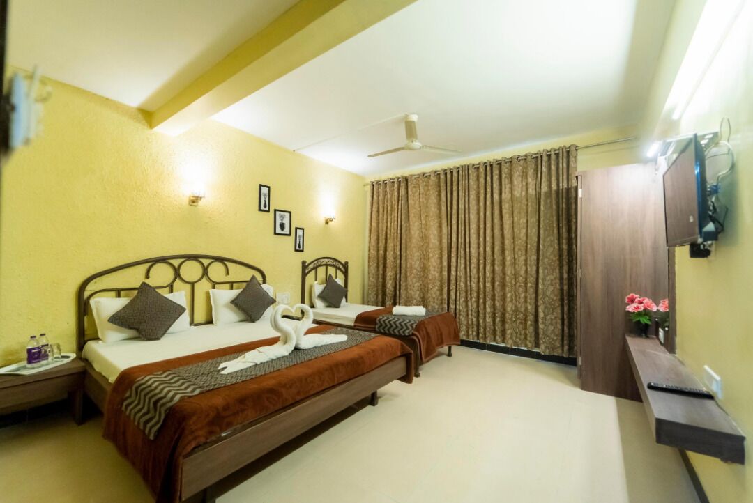 Kamar Triple Deluks, pemandangan kota | Meja kerja, kedap suara, dan Wi-Fi gratis