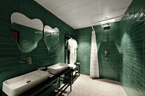 Superior King Room | Bathroom | Shower, slippers, towels, toilet paper - The Village Edit - Minimalist Hotels (New Delhi)