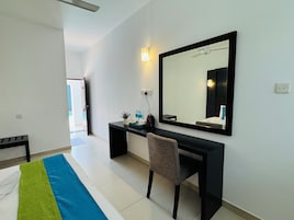 Basic Double or Twin Room | Living area | TV