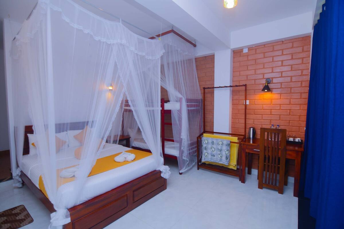 Deluxe Quadruple Room, 1 Bedroom, Balcony, Mountain View | Soundproofing, iron/ironing board, WiFi (free)