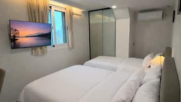 Superior Triple Room, City View | Desk, laptop workspace, free WiFi