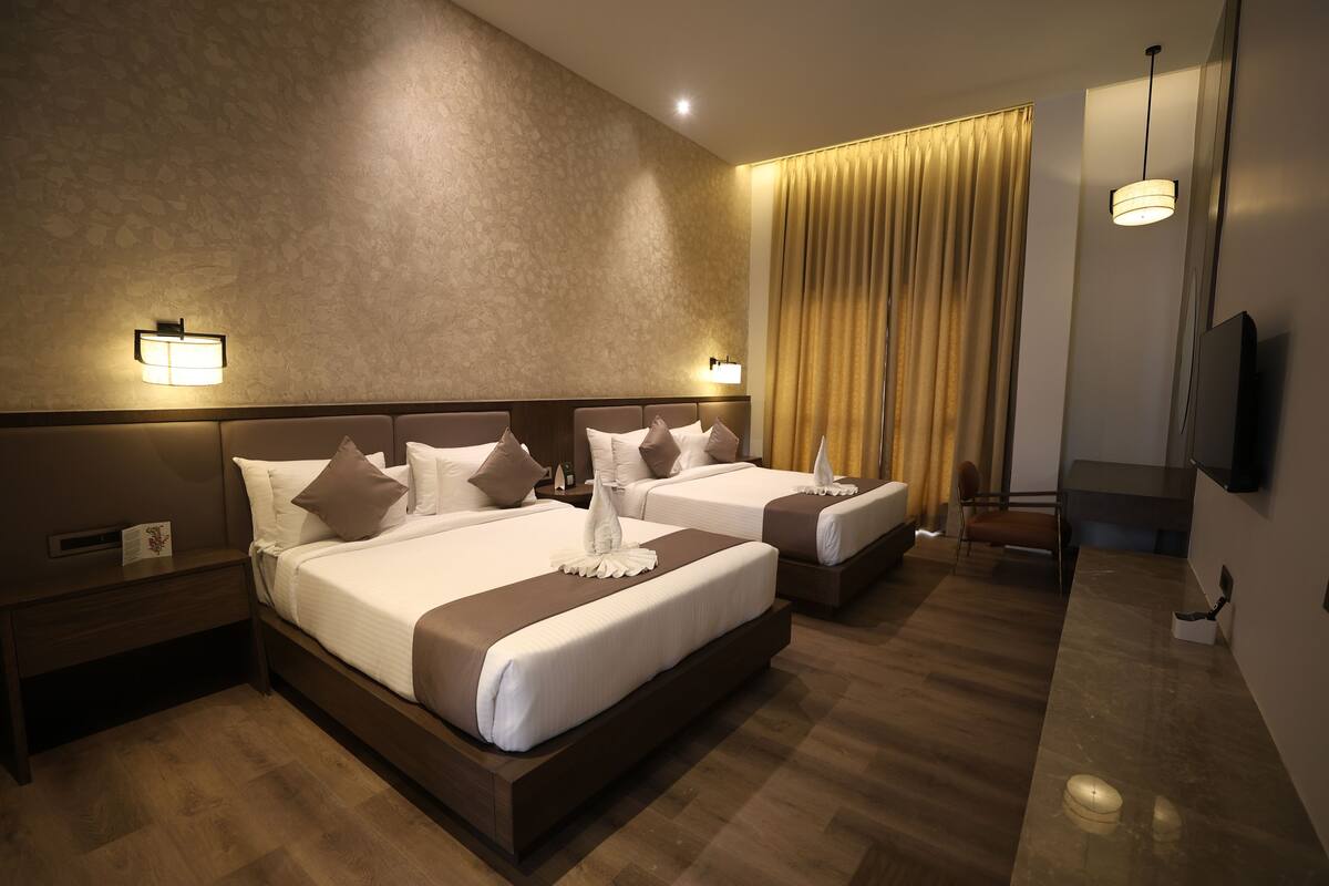 Deluxe Double Room, Garden View | In-room safe, blackout curtains, iron/ironing board, free WiFi
