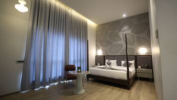 Deluxe Room, Garden View | In-room safe, blackout drapes, iron/ironing board, free WiFi