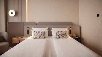 Hypo-allergenic bedding available, minibar, in-room safe