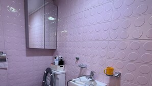 A bathroom with a toilet, sink, and mirror. - Strawberry_Charming studio with AC in vibrant Ewha Univ. neighborhood (Seodaemun-gu,)