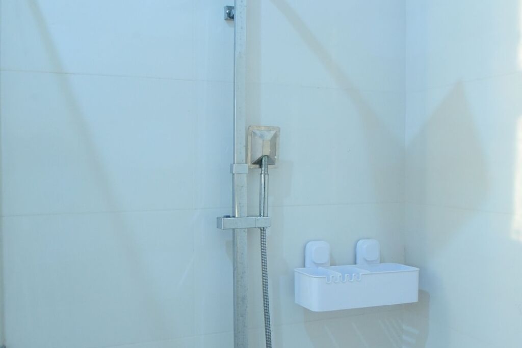 Shower, towels, toilet paper