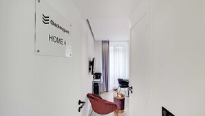 A hotel room with a sign reading "Checkmyguests HOME 4". - Superb Suite with AC Beaubourg Le Marais (Paris)