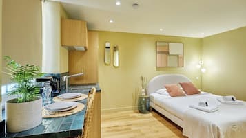 1 bedroom, desk, iron/ironing board, bed sheets