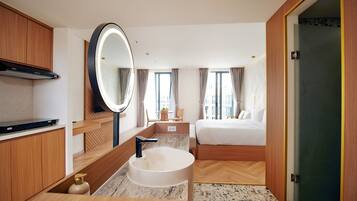 Luxury Studio, 1 King Bed, Ocean View | Bathroom | Shower, hydromassage showerhead, designer toiletries, hair dryer