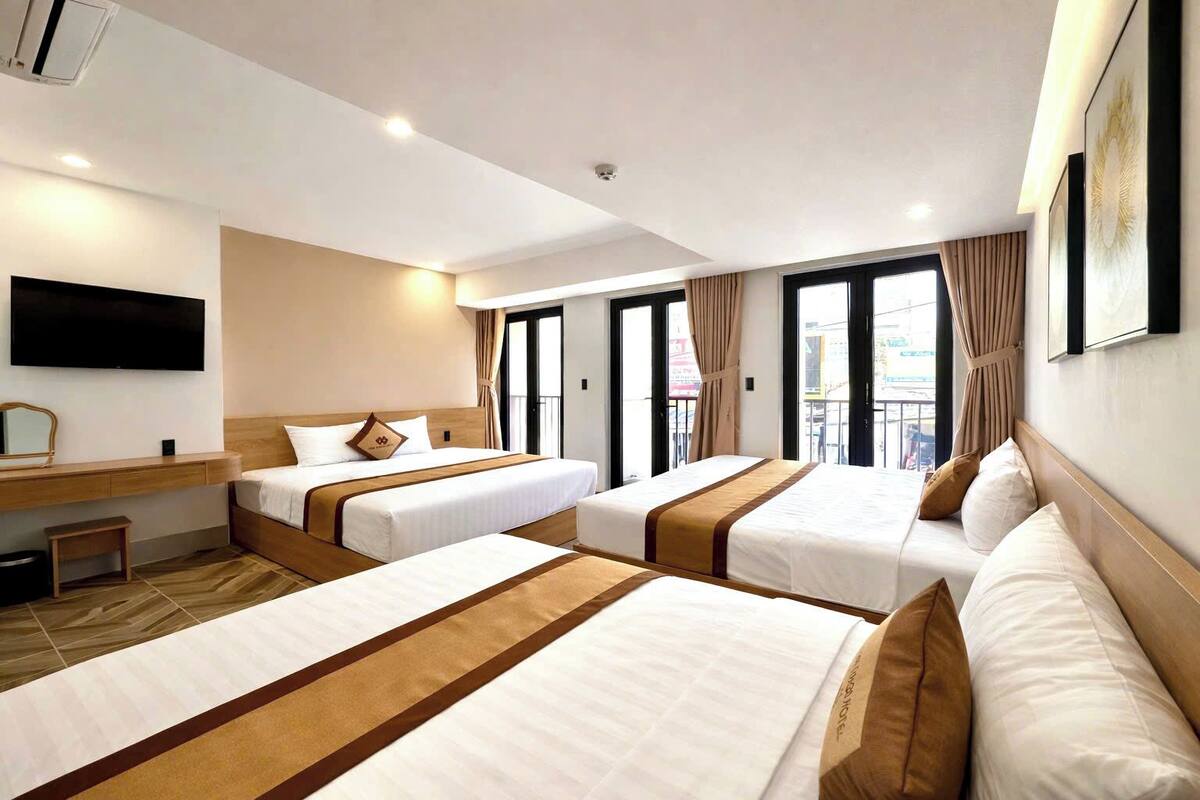 Family Room, Balcony, City View | Minibar, soundproofing, iron/ironing board, WiFi (free)