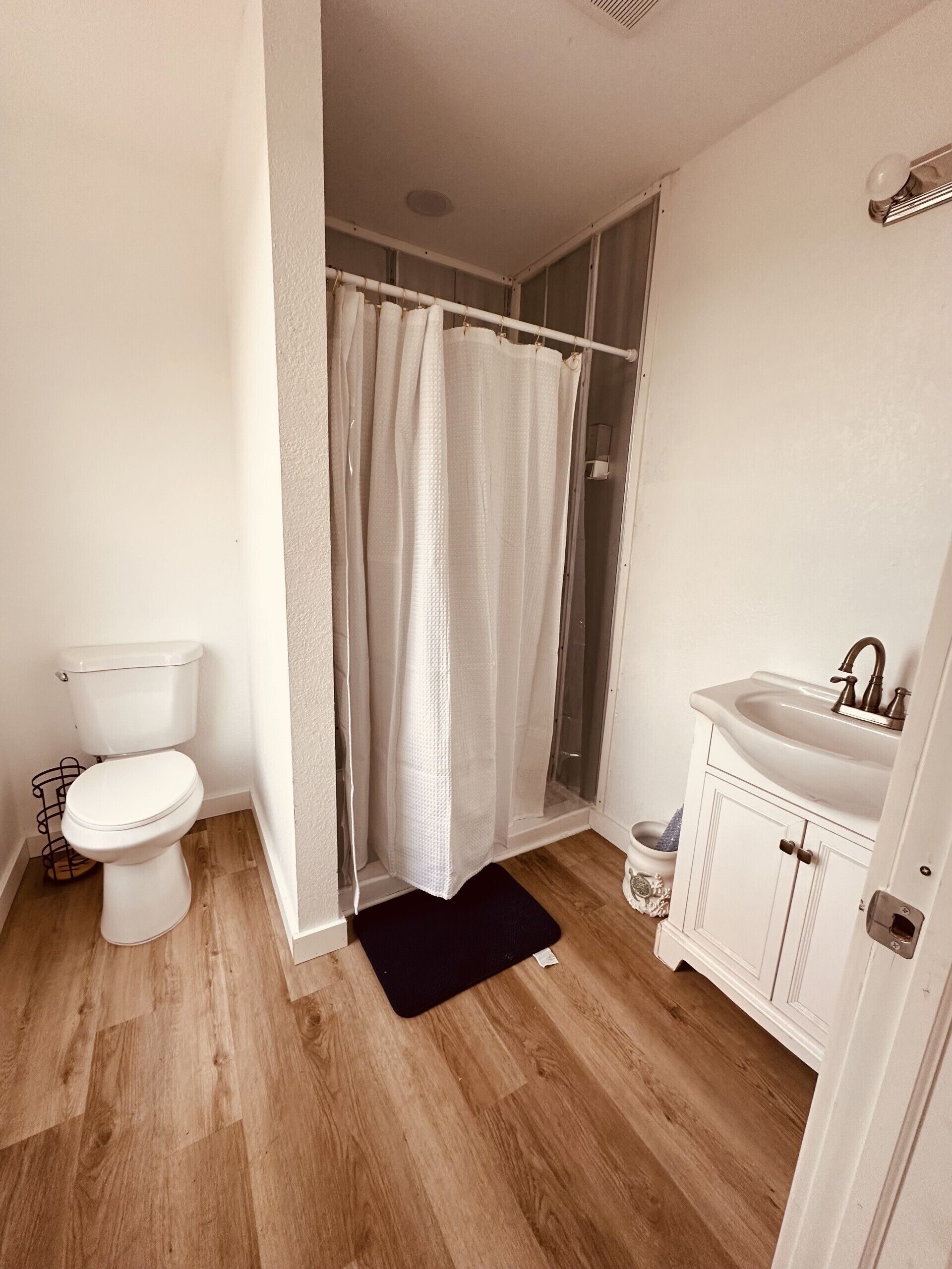 Shower, towels, soap, toilet paper