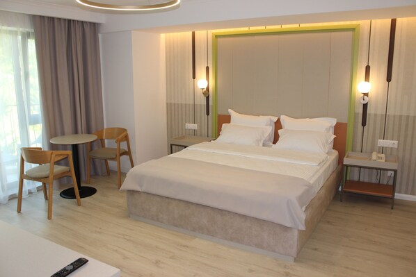 Superior Double Room, Balcony, Garden View | Desk, laptop workspace, free WiFi