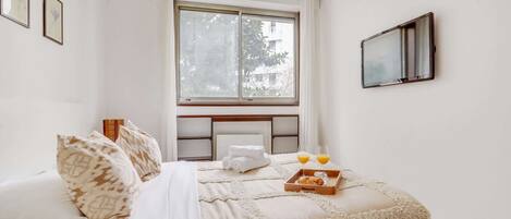 Desk, iron/ironing board, travel cot, free WiFi