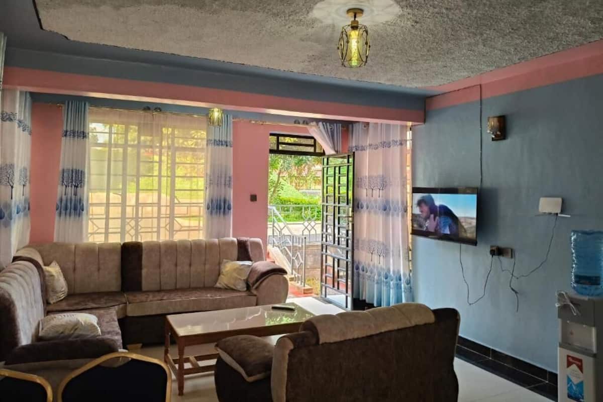 Family Apartment, Balcony, Garden View | Living area