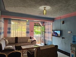 Family Apartment, Balcony, Garden View | Living area