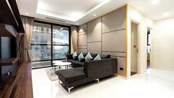 Grand Suite, 1 Bedroom, Club lounge access, City View | Living area | 665-inch Smart TV with cable channels, fireplace, Netflix