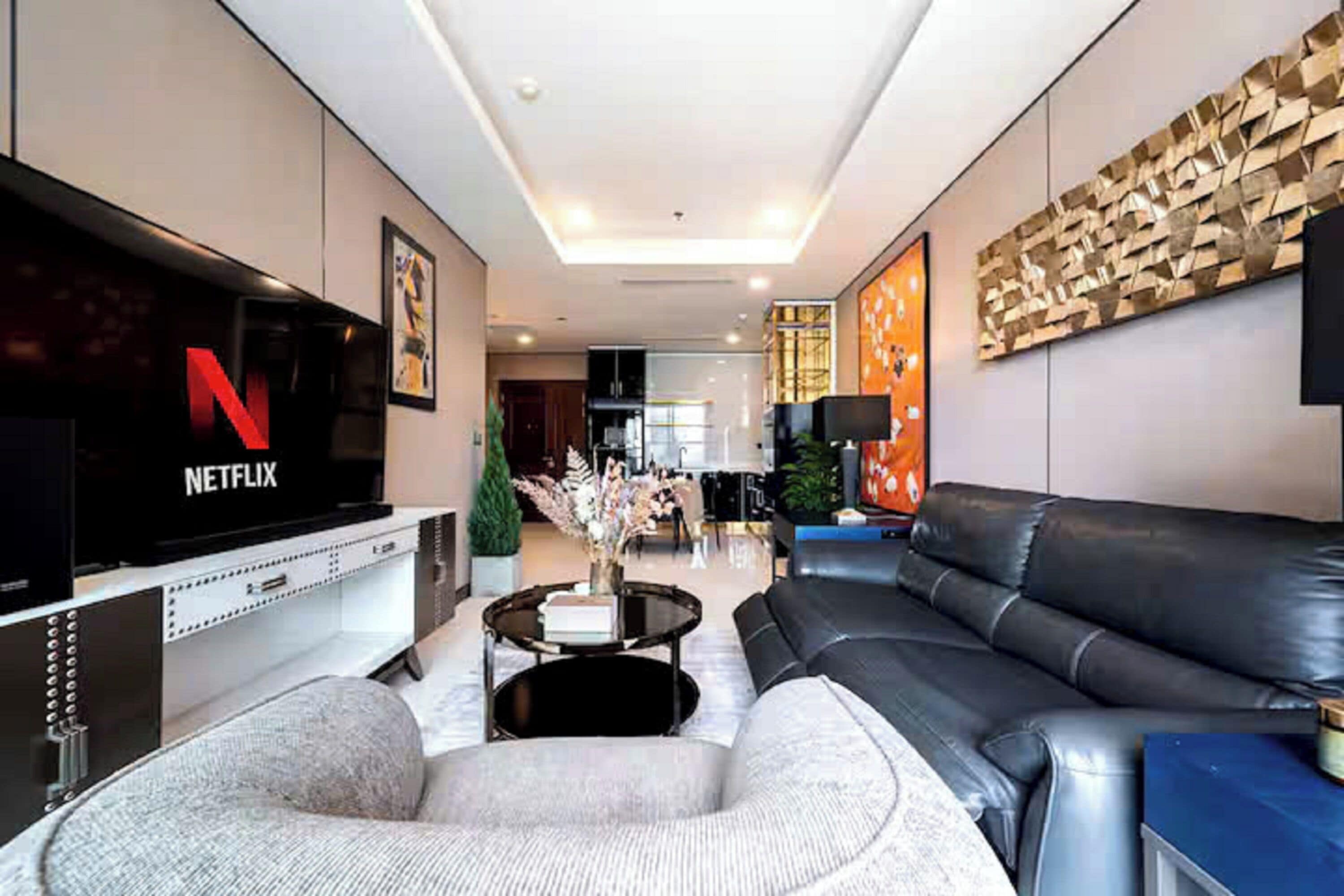 Presidential Suite, 2 Bedrooms, Club Lounge Access, City View | Living area | 665-inch Smart TV with cable channels, fireplace, Netflix