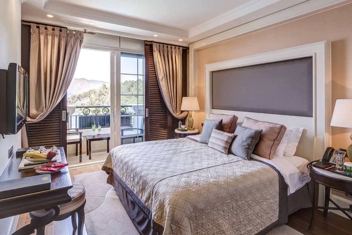 Habitación Premium, 1 habitación, vista al mar | Artículos del minibar gratis, wifi gratis y ropa de cama