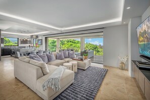 TV - Enjoy ocean views, refined interiors, and an infinity pool that embodies Kauai’s tropical beauty. (Princeville)
