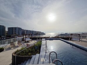 2 outdoor pools, free pool cabanas, pool umbrellas - Luxury Marina Apartment - Self Catering (Gibraltar)