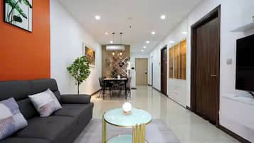 Presidential Suite, 2 Bedrooms, Club lounge access, City View | Living area | 65-inch Smart TV with cable channels, Netflix, pay films