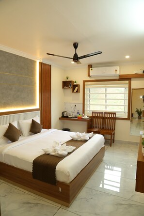 Superior Double Room, Balcony, Garden View | Desk, laptop workspace, soundproofing, iron/ironing board - Cloud9 Airport Hotel (Aluva)