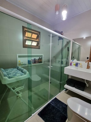 Shower, towels, toilet paper