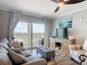 Smart TV - Unwind in this beautifully designed 1BR Sandpoint condo in Daytona Shores, where each evening ends with stunning sunset views over the Intracoastal. Just steps from the beach, it’s the perfect place to relax, recharge, and enjoy coastal living. (Daytona Shores)