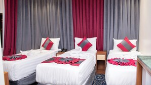 Basic Triple Room | Living area - Masar Almisk Hotel (Makkah)