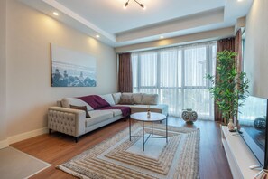 Living area - Luxury 1BR in Sirius Town • Pool, Spa & Fitness Center - Snitch (Antalya)