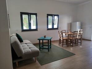Deluxe-Apartment, Gartenblick | Wohnbereich