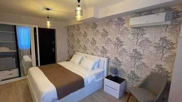 Superior Triple Room, City View | In-room safe, iron/ironing board, free WiFi