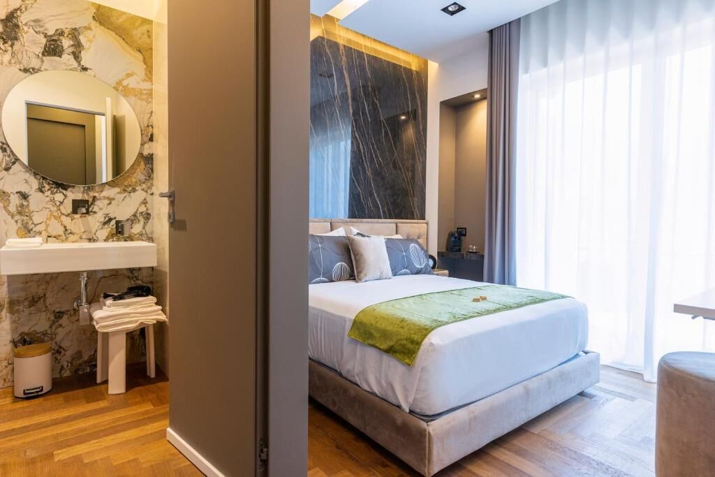 Deluxe Double Room, Balcony, City View | In-room safe, iron/ironing board, free WiFi