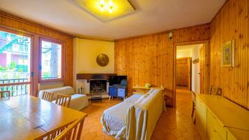 Apartment, 2 Bedrooms, Balcony | Living area | Flat-screen TV