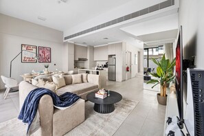 TV, video games, books - Family 4BR Villa | PS5 & Garden | New Community (Dubai)