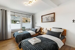 2 dormitorios, tabla de planchar con plancha, wifi y ropa de cama