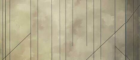 A geometric wall design with a door and a keyhole.